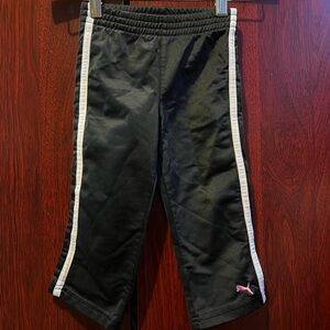 Puma Black track pants with White Side Stripes and Pink Logo